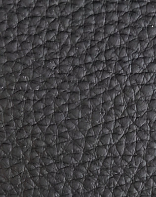 G7686 black automotive PVC leather with distinctive geometric embossed texture, suitable for car seat upholstery, door panels, yacht interiors, sofa and furniture applications
