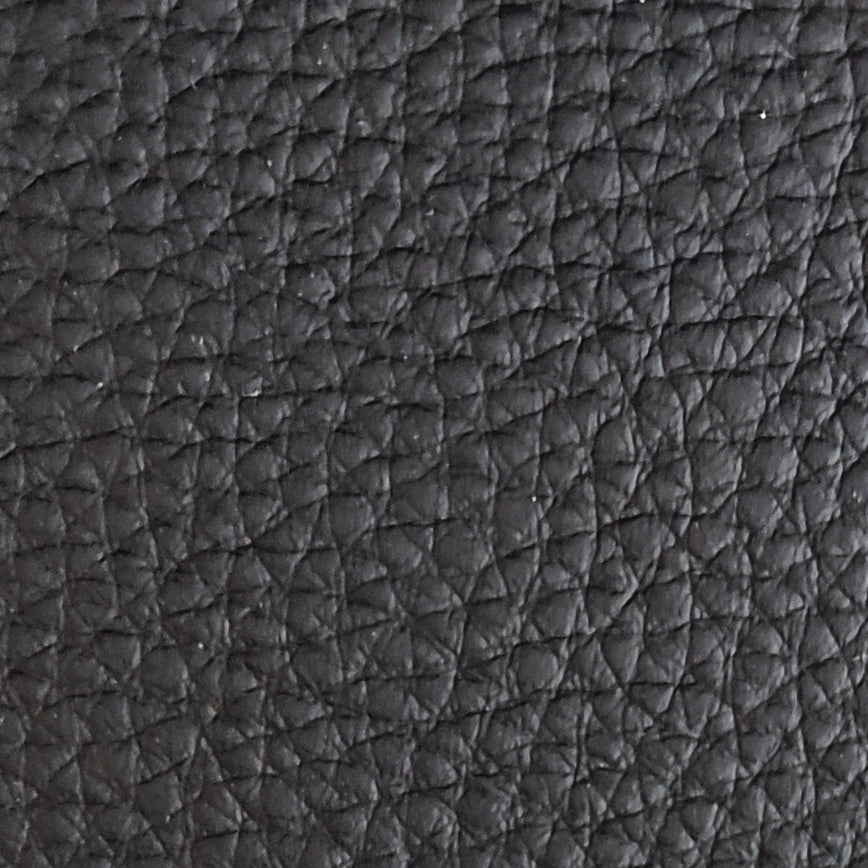 G7686 black automotive PVC leather with distinctive geometric embossed texture, suitable for car seat upholstery, door panels, yacht interiors, sofa and furniture applications