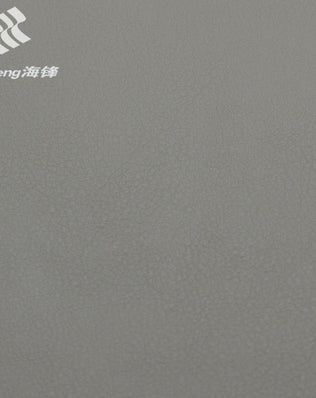 G7685A medium grey automotive PVC leather with fine grain texture, ideal for car seat upholstery, door panels, yacht interiors and high-end sofa applications
