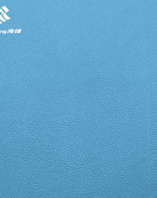 light blue automotive PVC leather with fine embossed texture, ideal for car seat upholstery, door panels, yacht interiors and furniture. High durability and easy maintenance.